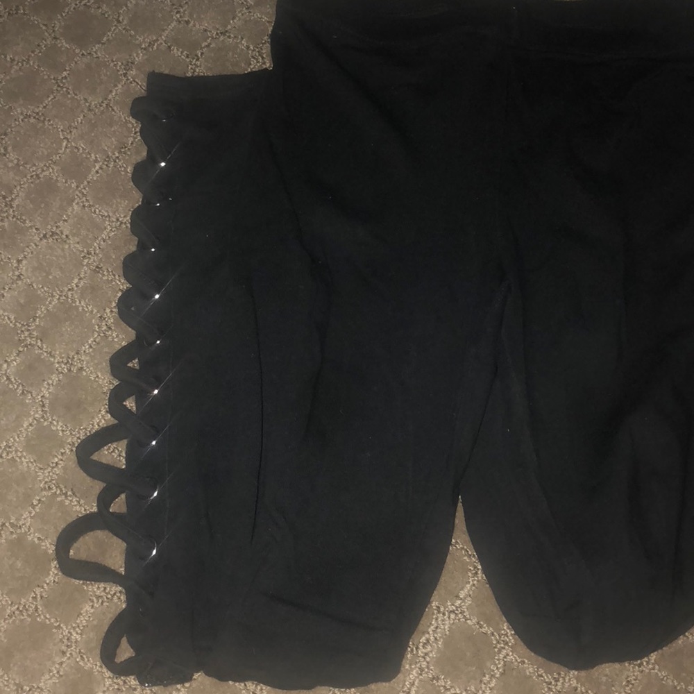 Black leggings with toes at bottoms
